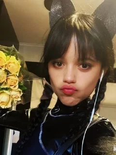 😗 emoji Jenna Ortega 🎧 Telegram sticker 4 of 14